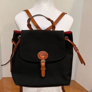 Dooney & Bourke-Black & Brown with Red interior Nylon Flap Backpack.